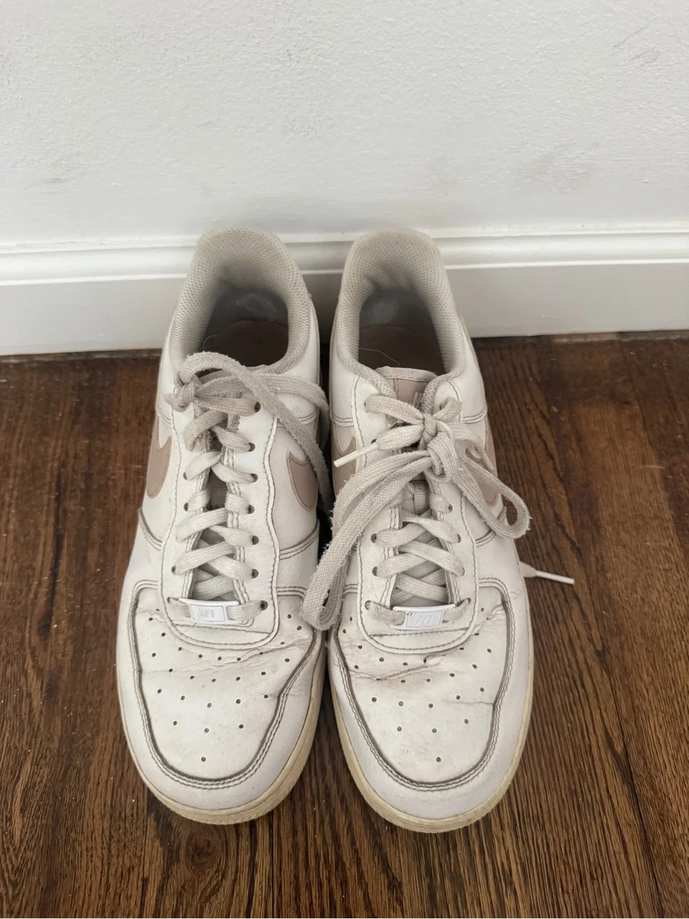 Nike air white sneakers with pink swoosh
